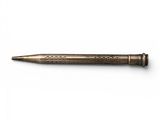 a pen that is sitting on top of a white surface