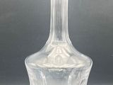 a clear glass vase sitting on top of a table