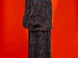 an image of a mannequin dressed in a suit and tie