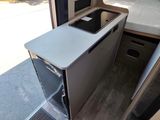 a small kitchen in the back of a camper