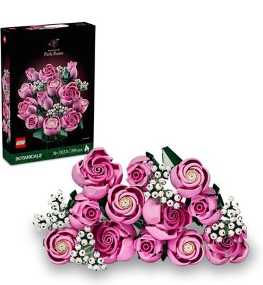pink roses are arranged in a bouquet next to a black box