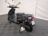 a scooter that is parked in a room