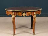 an image of a small table with a marble top and gold decoration