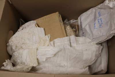 a cardboard box filled with a lot of white stuff