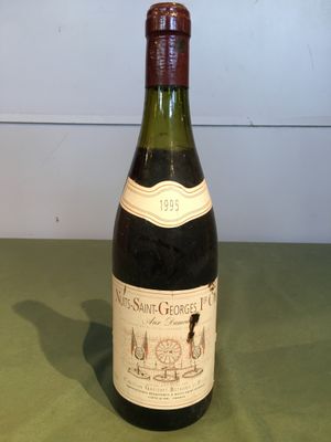 a bottle of wine that is sitting on a table