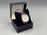 a watch that is sitting in a box on a table