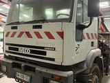 a large truck that is parked in a garage