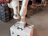 a robot that is sitting on top of a box