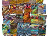 a pile of pokemon cards sitting on top of each other