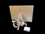 a laptop computer and a charger on a table