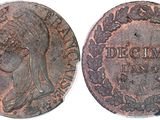 a close up of a coin with an image of a woman on it