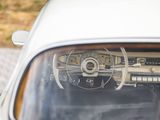a close up of a car ' s dashboard and steering wheel