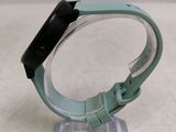 a watch that is sitting on top of a clear stand