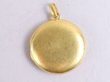 a close up of a gold locke on a white surface