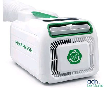 a white and green air conditioner on a white background