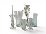 a lot of glass vases and vases on the table