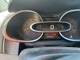 a close up of a car dashboard with various gauges