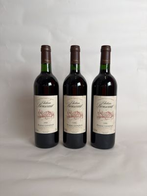 three bottles of wine sitting on top of a table next to each other