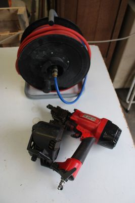 a picture of a red and black cordless nailer and a black and red cordless nailer