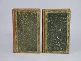 pair of antique brass bookends with green and gold paint