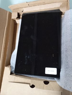 a box with a laptop inside of it on a table