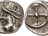 une pièce d'argent portant l'image d'un homme