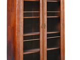 an image of a bookcase with a glass door