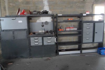 a room with a bunch of metal cabinets in it