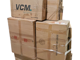 many boxes stacked on top of each other on a pallet