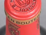 a close up of a bottle of wine on a table