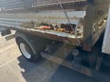 a truck that is parked on the side of the road