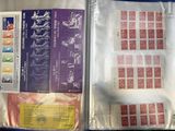a lot of stamps in a bag on the table