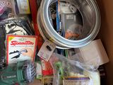 a box full of household items that are in the box