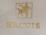 the logo on the back of a white shirt with a gold horse on it