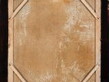 an old picture of a wooden frame with a picture on it