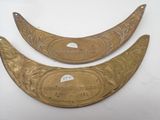 pair of antique brass plated brass wall hangings with engraved design
