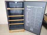 an image of a wine cooler with a menu on the door