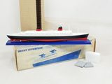 a toy boat that is sitting on top of a box