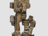 une image représentant une sculpture d'un arbre réalisée à partir de blocs