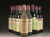 six bottles of wine are lined up in a row on a table