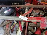 a lot of tools that are sitting on the floor