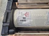 a roll of paper sitting on a pallet with a barcode on it