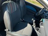 a small car with two seats in the back of it