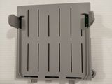 an overhead view of a gray plastic box with two wires attached