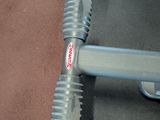 a metal object on the floor of a gym room