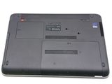 a close up of a laptop on a white surface