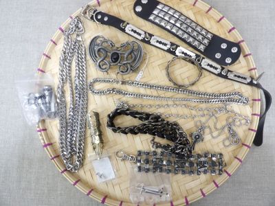 a basket with a lot of jewelry on it