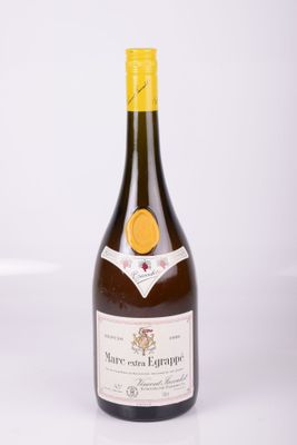 a bottle of wine that is sitting on a table