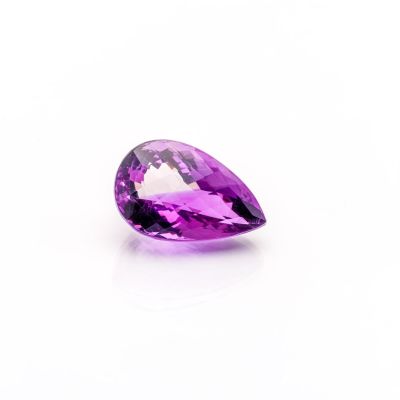 a purple amethorate gems on a white background