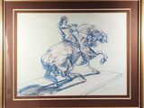 painting of a man riding a horse in a brown frame